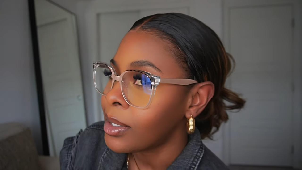 Tara Shanice wearing Lensmart Huck frames, the nude/pinkish tortoise - patterned blue light glasses ideal for style rebels.