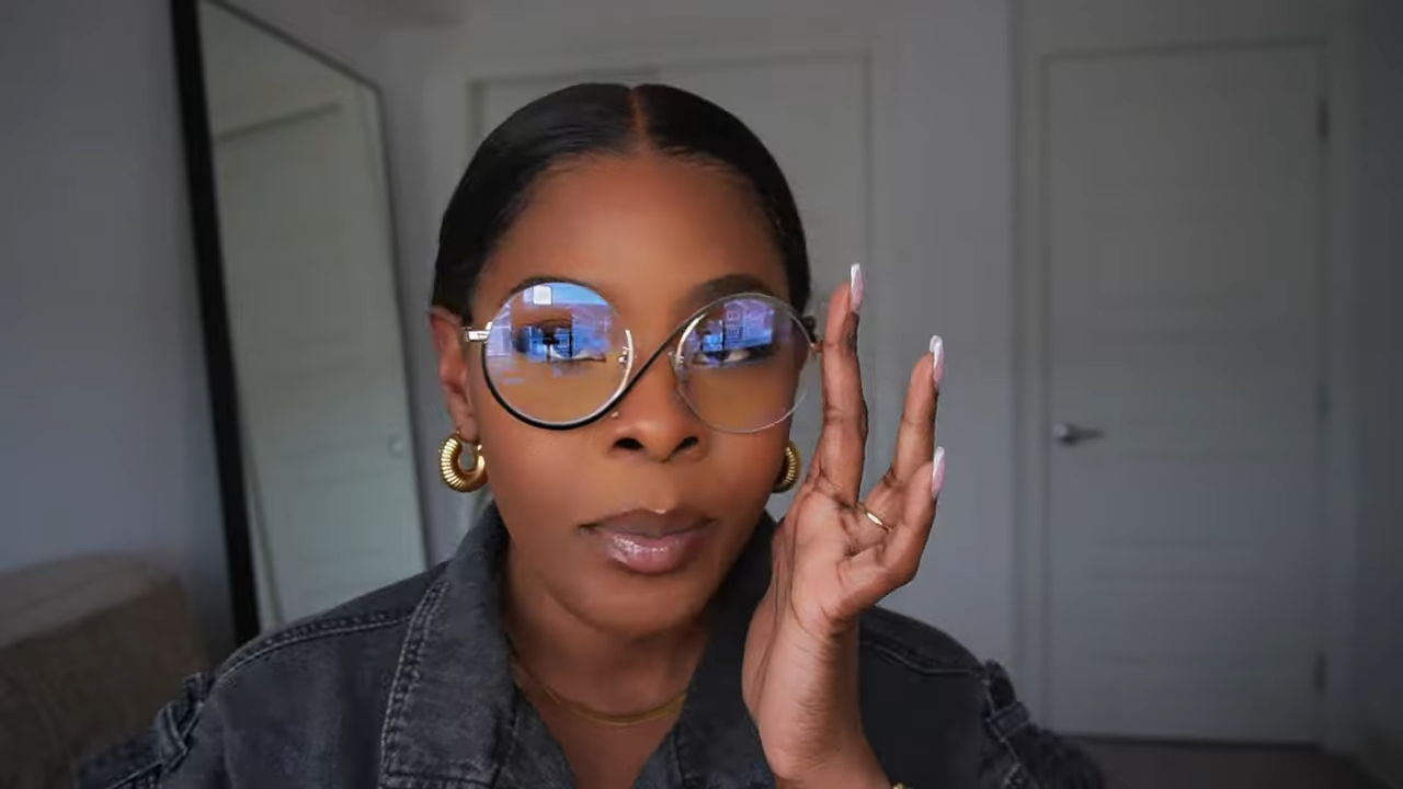 Tara Shanice wearing Lensmart Nevaeh frames with a gold double - bridge, black accents, for fashion risk - takers seeking Instagram - worthy looks.