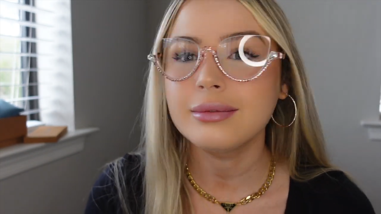 Michaela wearing Behati semi - rimless glasses with pink rhinestones on lower half and bridge, her favorite for adding glamour, as described in the Lensmart haul.