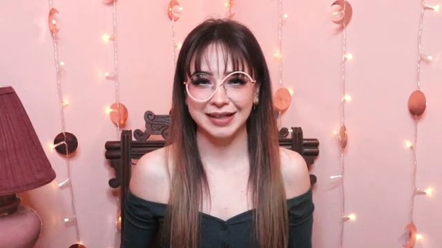 Zoe wearing Nevaeh unique S-shape design glasses, featuring semi-rimless, round, metal frames with a unique S-shape, prescription is accurate.