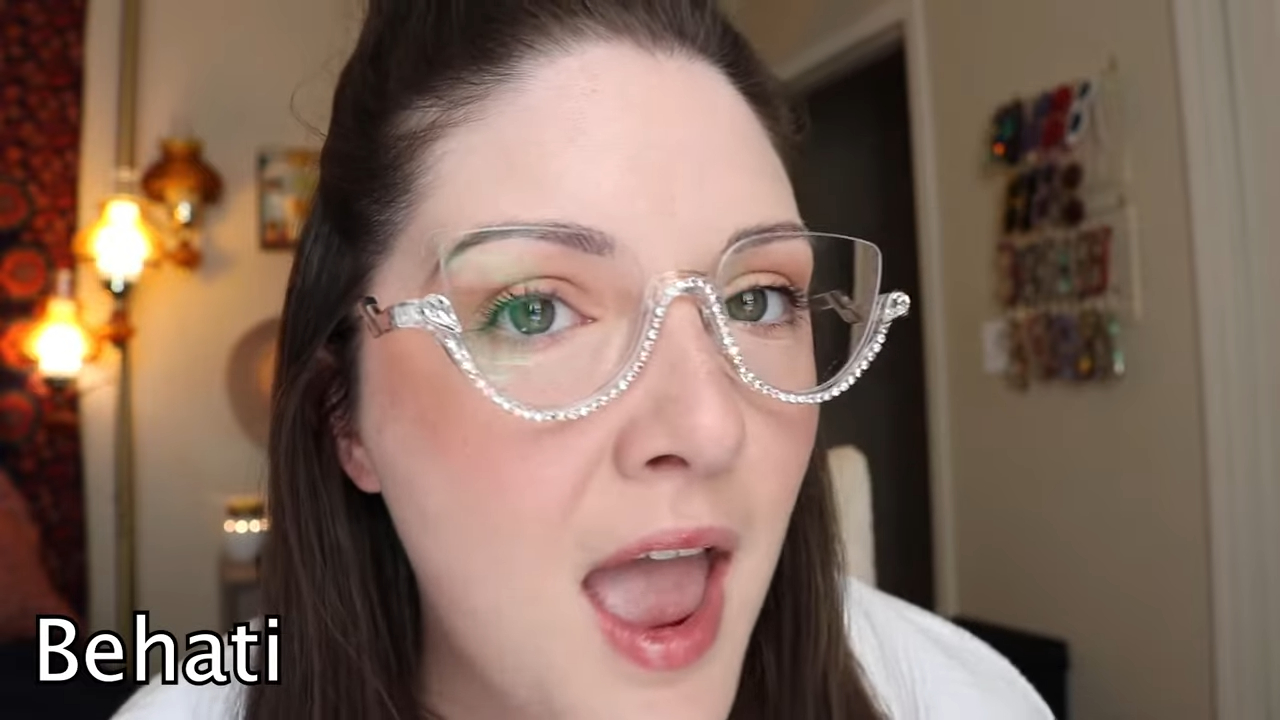 Hannah wearing Lensmart Frode frames, featuring tortoise shell design, metal construction, and adjustable nose pads as her top - pick go - to eyewear.