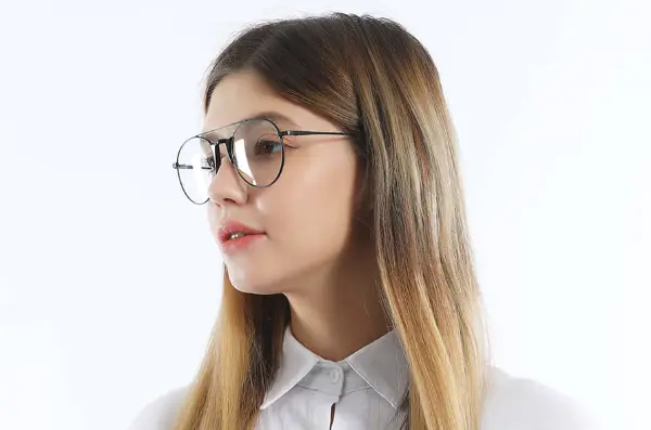 a lady wearing designer glasses