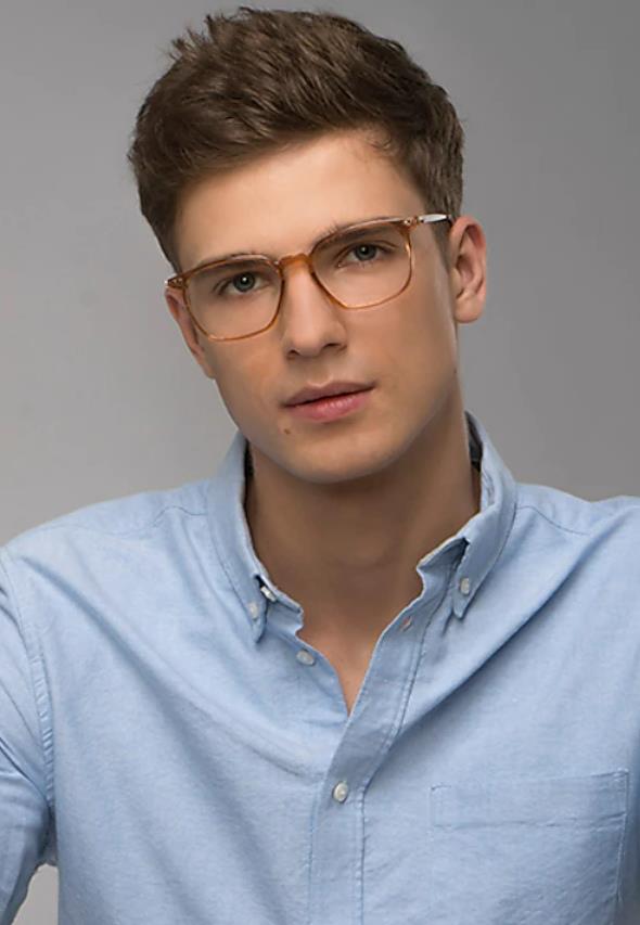 A man wearing orange glasses
